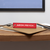 Aeon Psych - Jet Tag Keychain - red